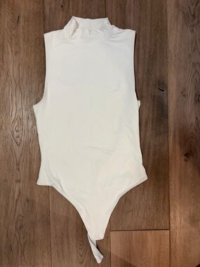 Babaton White Sleeveless Mock Neck Bodysuit